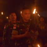 TNI Merayakan Paskas Dengan Meriah di Malam Hari dengan Warga Kampung Kumaf , Minggu (17/04/2022), (Foto: V24/AL)